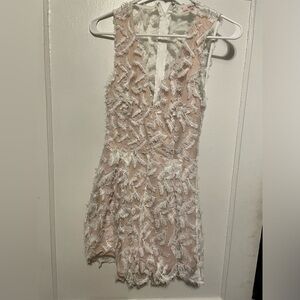 Size small, zip up back romper